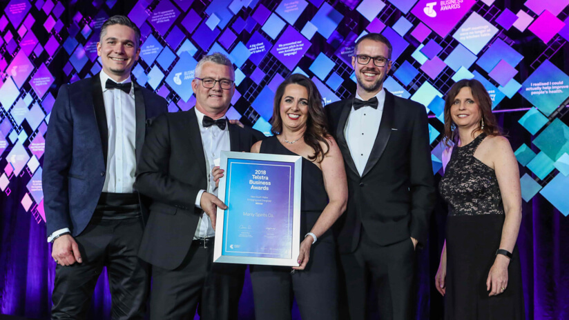 David Whittaker and the Manly Spirits Co. Team smile at the 2018 Telstra Best of Business Awards.