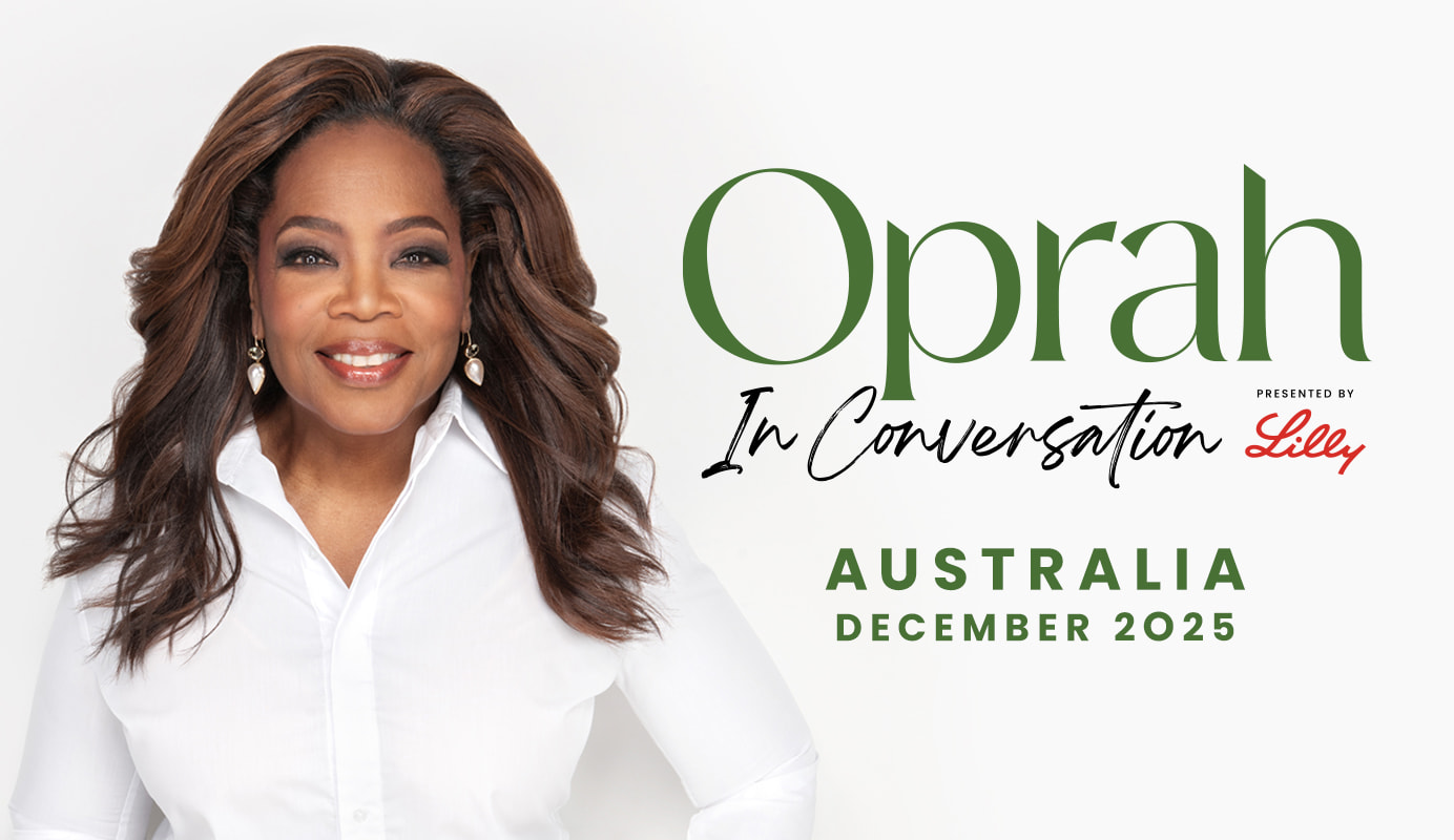 Promotional image for Oprah Winfrey’s In Conversation Tour. Oprah is shown against a plain white background, wearing a white shirt with her hair styled in loose waves. Text on the image reads: "Oprah In Conversation Presented By Lilly AUSTRALIA DECEMBER 2025"