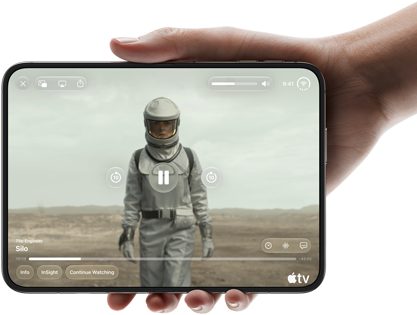 iPhone Duo, held with one hand, opened in horizontal orientation, fully unfolded, interior screen displays Apple TV show 