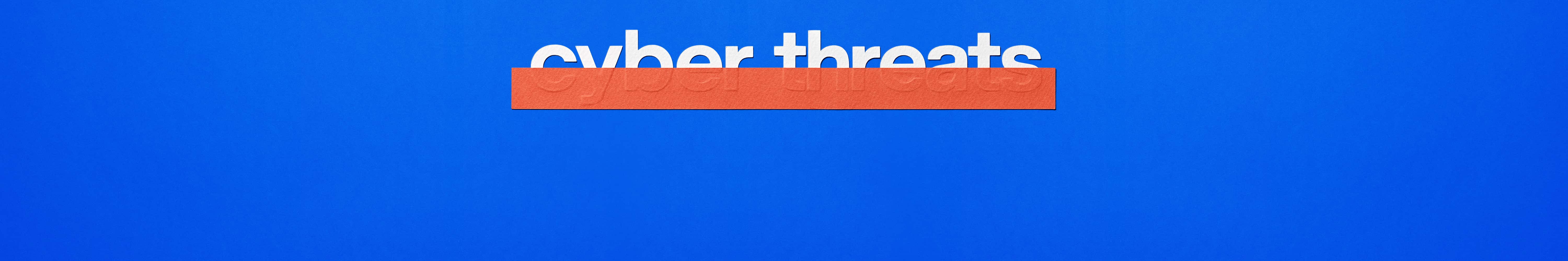 White text on blue background showing the word 'cyber threats' that has been partially masked by orange tape.