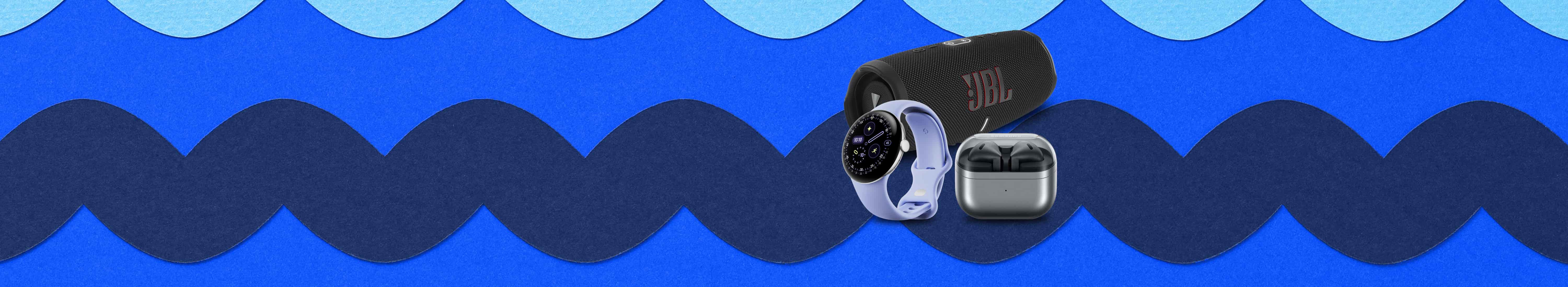 Flat lay of accessories. Black JBL portable speaker in background, left angled Google smartwatch with purple band in foreground to the left, and black Samsung Galaxy Buds3 in silver charging case to the right.