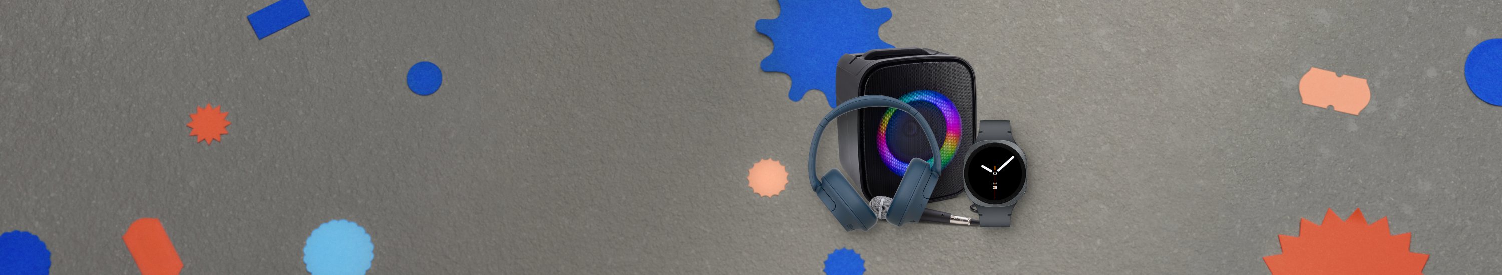 Image showing three accessories. Blue Sony WH-CH720N Wireless Headphones, graphite Samsung Galaxy Watch8, and black Sprout Soundloop Party Speaker.