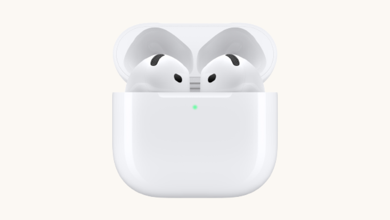 Apple AirPods 4 in white, placed inside an open charging case with a visible green indicator light on the front.