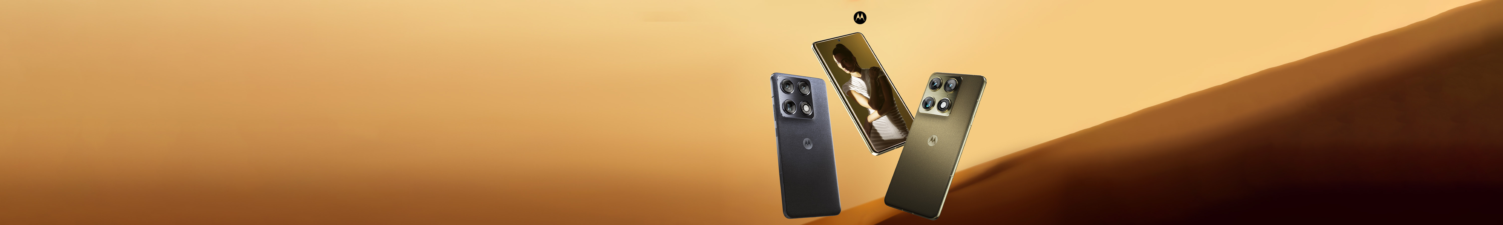 Three motorola signature phones in the two available colours - Carbon grey and Martini Olive green. Two of the phones show rear quad camera array.