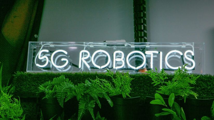 A neon sign that reads 5G Robotics